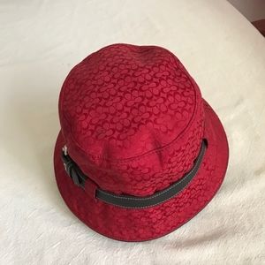 Coach red fabric hat with leather strap band
